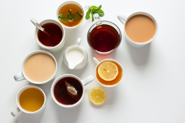 Flat-lay photography of variety of beverage filled glasses